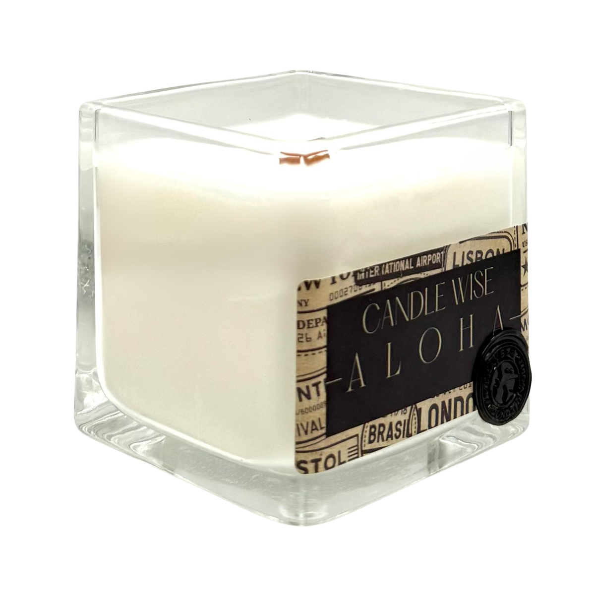 Clear glass square candle jar with black Aloha label and wooden wick artisanal home fragrance