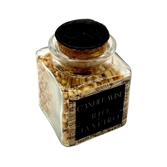 Angled top view of CANDLE WISE Rio open jar drawer diffuser showing the natural cork stopper with stamped wax seal and filled corn cob granules.