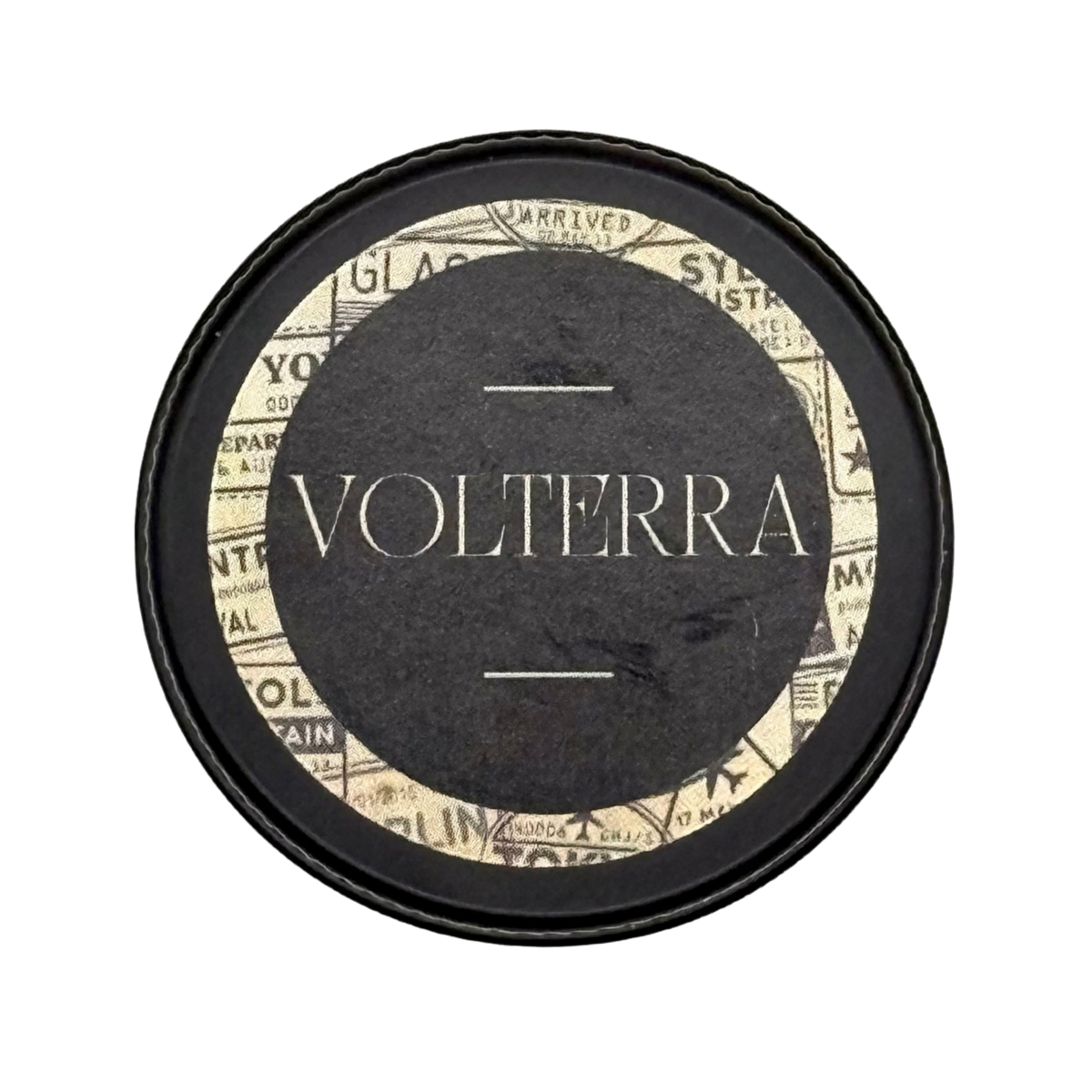 Candle Wise Volterra solid perfume closed black tin lid with vintage travel label.