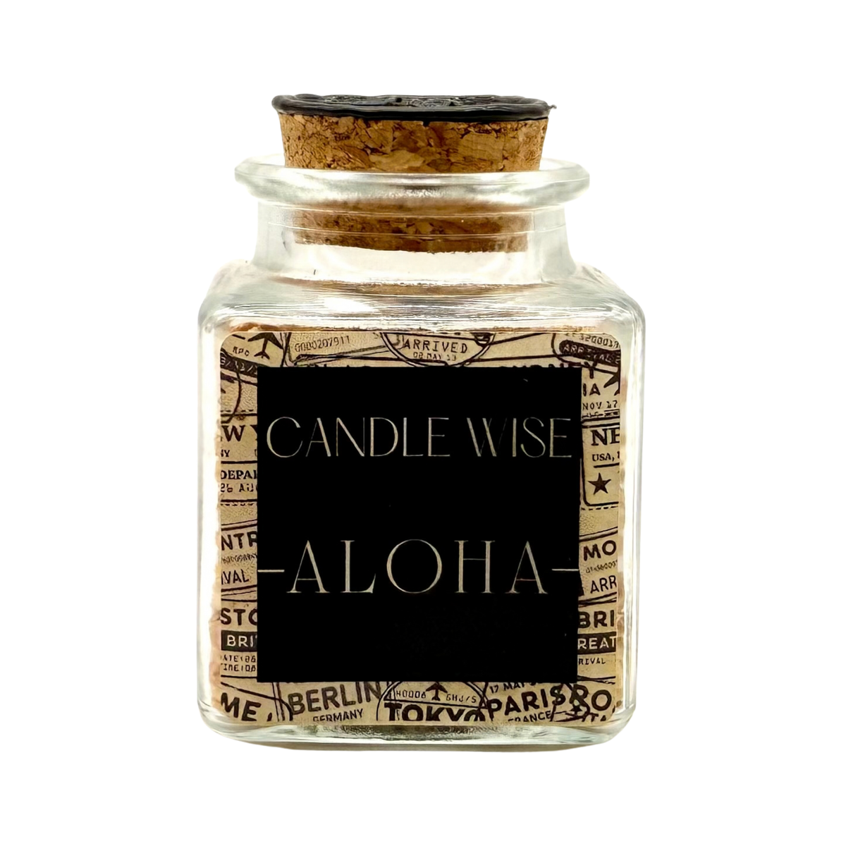 CANDLE WISE Aloha scented corn cob granule drawer diffuser in a square glass jar with a cork stopper and black wax seal, front view.