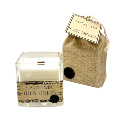 Candle Wise Iden Green large square glass candle presented alongside branded jute gift bag