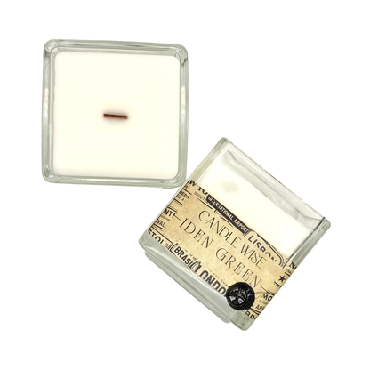 Overhead top view of Candle Wise Iden Green large square glass candle showing poured wax and wooden wick