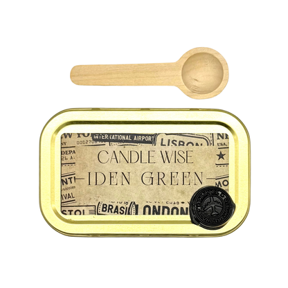 Candle Wise Iden Green scoopable wax melt gold tin lid with vintage travel label and wooden spoon