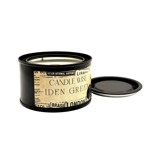 Candle Wise Iden Green travel size candle open black tin showing soy wax and wooden wick beside lid