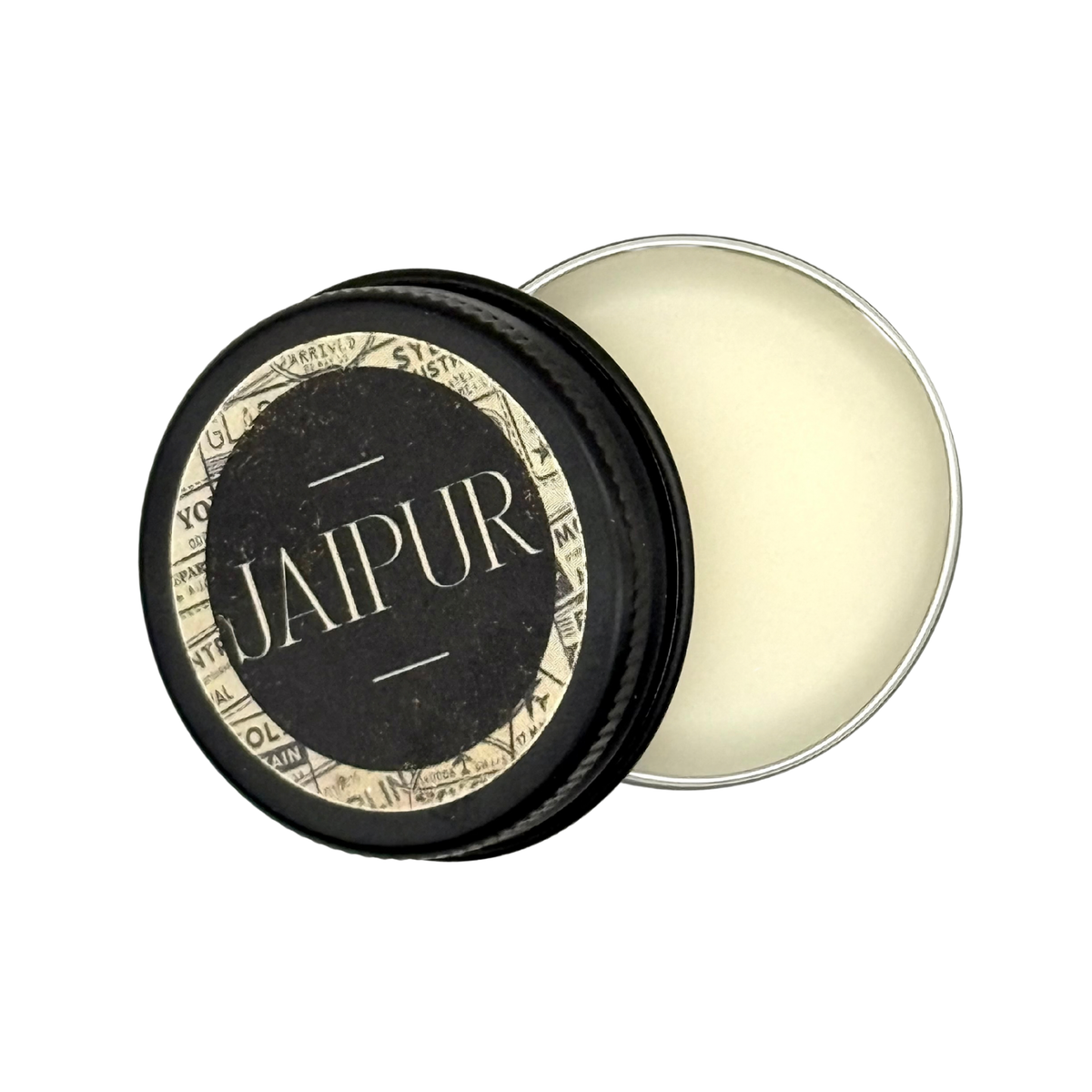 Candle Wise Jaipur solid perfume open black tin displaying white balm alongside the lid.