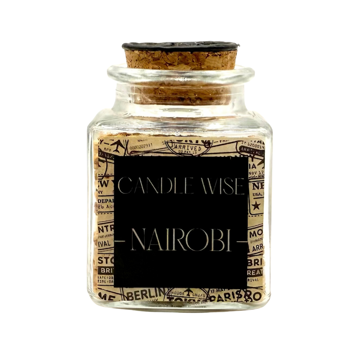 CANDLE WISE Nairobi scented corn cob granule drawer diffuser in a square glass jar with a cork stopper and black wax seal, front view.