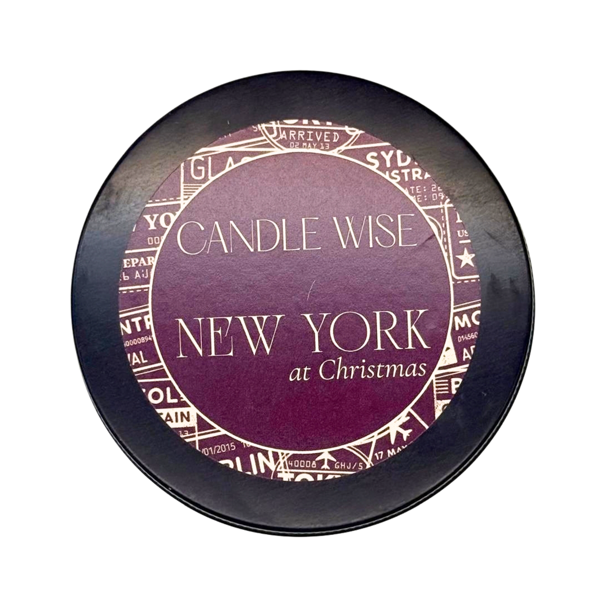 Candle Wise New York at Christmas scoopable wax melt tin lid with travel stamp design