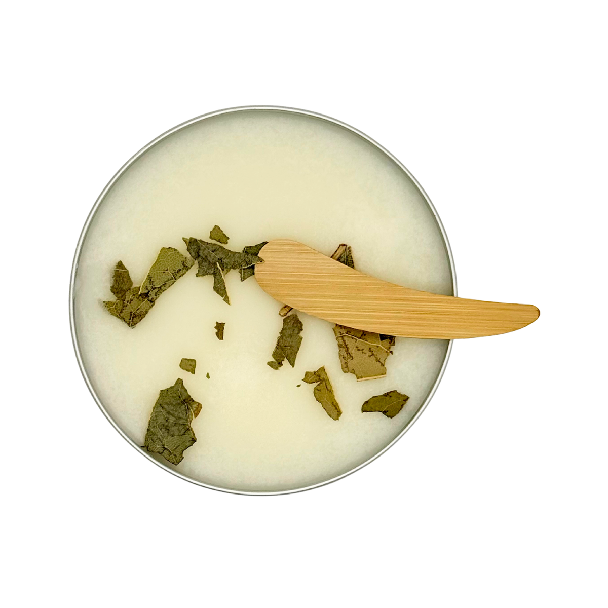 Candle Wise New York at Christmas scoopable wax melt tin topped with botanical leaves and wooden spoon