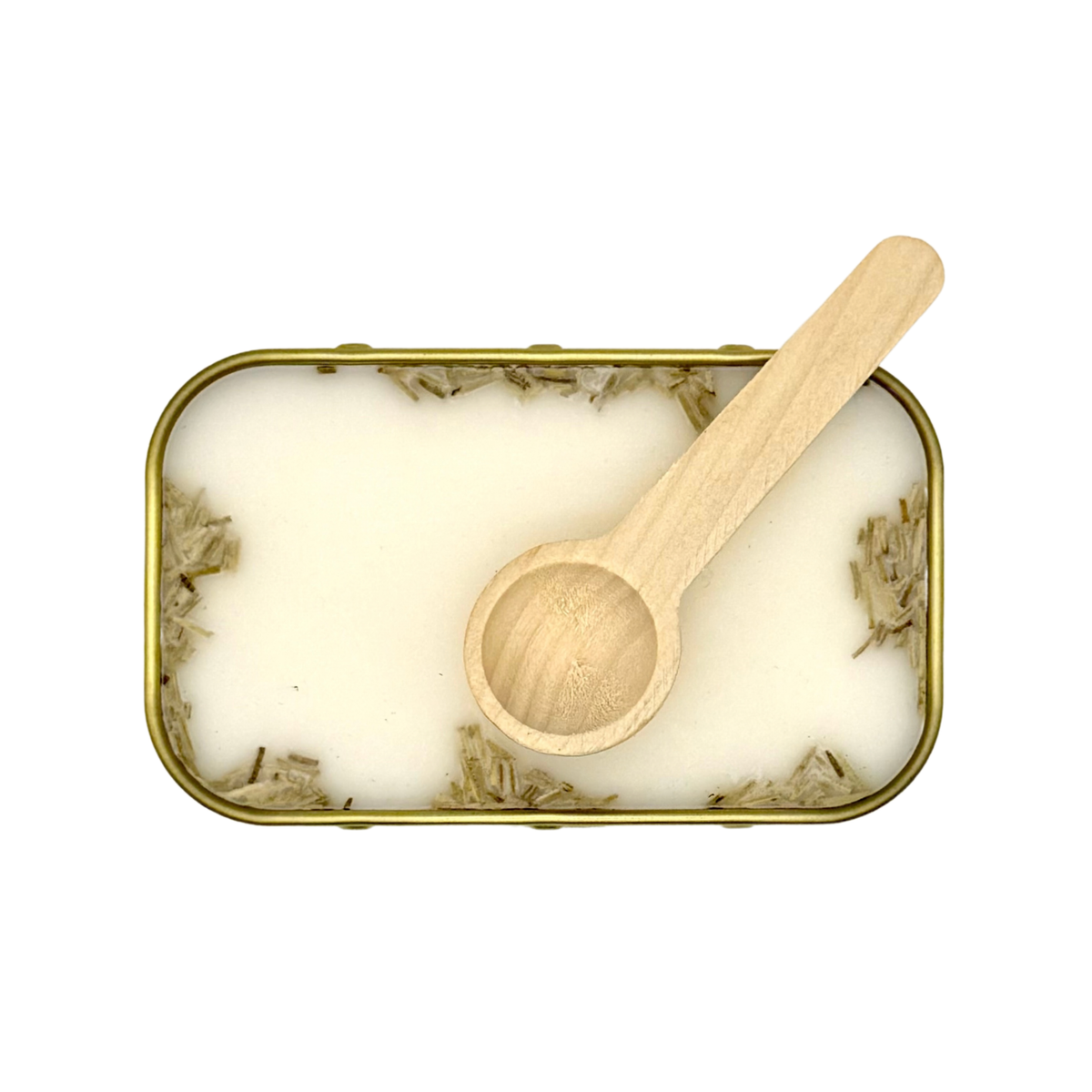 Overhead view of Candle Wise Cozumel scoopable wax melt showing botanical toppings and wooden spoon