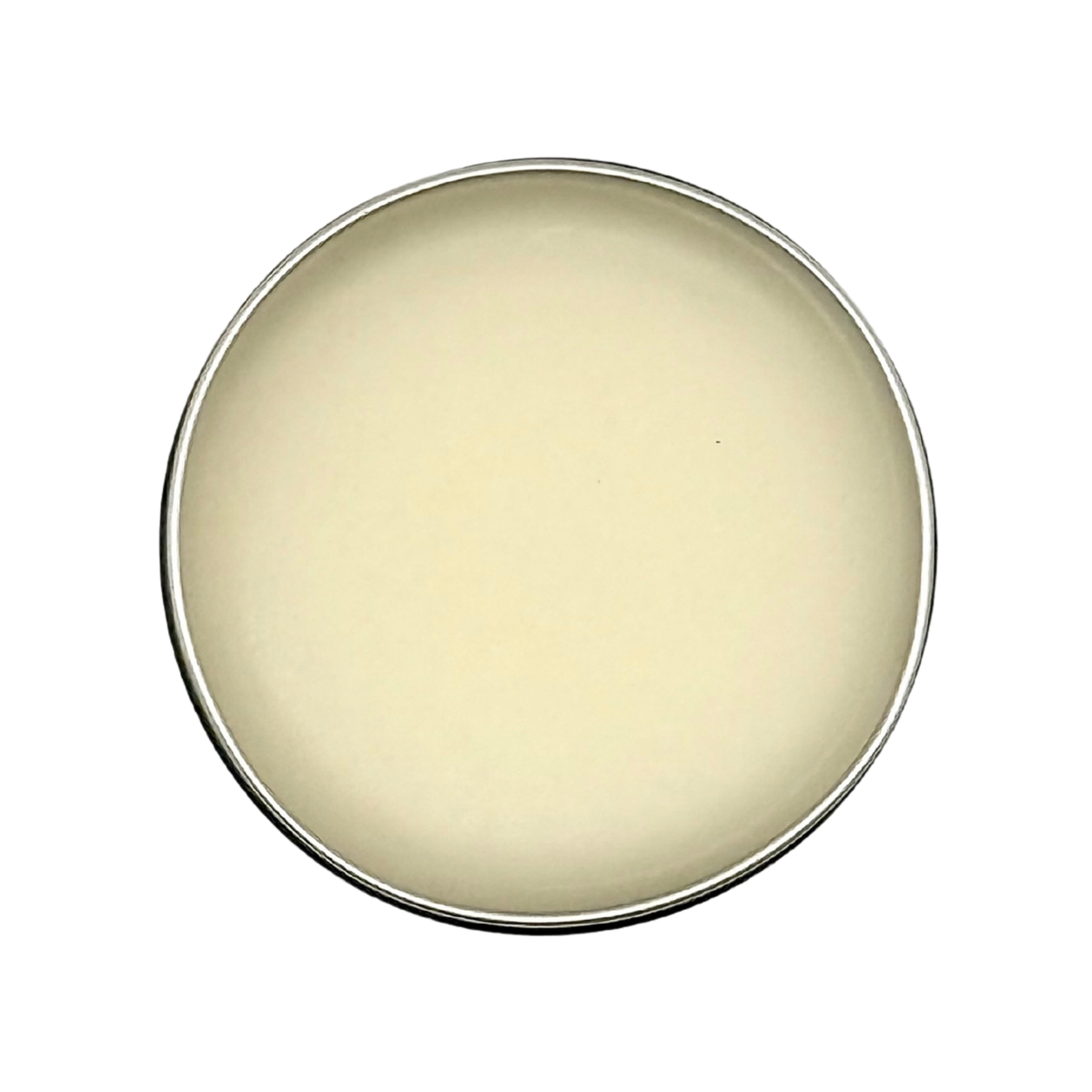 Overhead view of Candle Wise solid perfume open tin showing natural white fragrance balm.