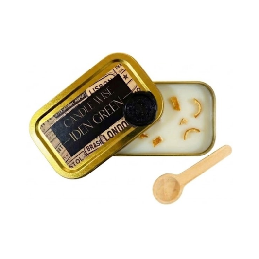 Iden Green scoopable wax melt in a gold travel tin with a vintage label and dried orange peel details.