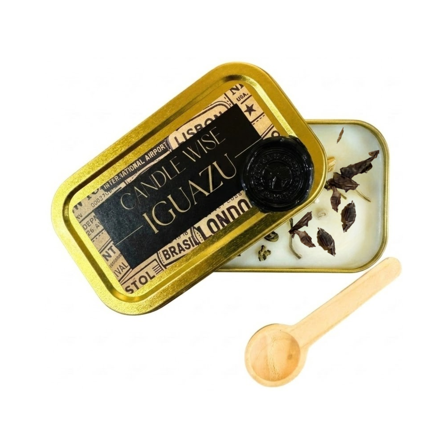 A closed gold rectangular tin of Candle Wise Iguazu scoopable wax melt with a black wax seal on the lid and a small wooden spoon placed above it